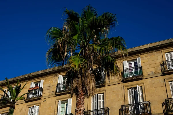 Building with balconies at The Plaza Nueva or Plaza Barria (New Square) of Bilbao, a monumental square of Neoclassical style built in 1821. Bilbao, Spain