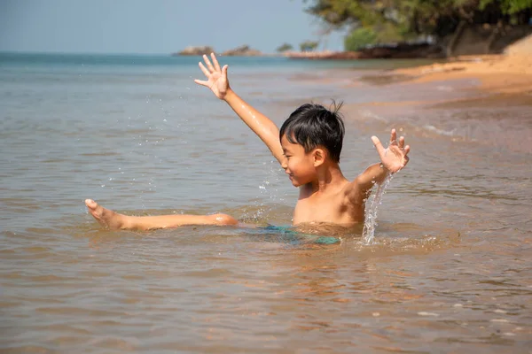 Boy Delighted Have Fun Playing Sea Stock Photo