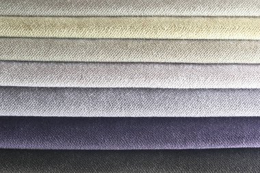 Renkli döşeme kumaşı örneklerinin toplanması. Kapatın. Çoklu renk kumaş dokusu arkaplanı.