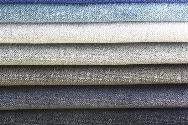 Renkli döşeme kumaşı örneklerinin toplanması. Kapatın. Çoklu renk kumaş dokusu arkaplanı.