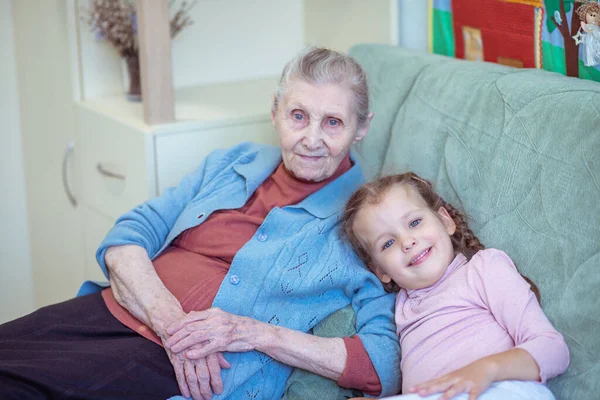 Portrait Old Woman Little Girl Grandmother Hugs Her Granddaughter Family — Stock Photo, Image