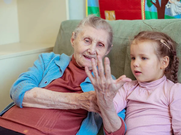 Portrait Old Woman Little Girl Grandmother Hugs Her Granddaughter Family — Stock Photo, Image