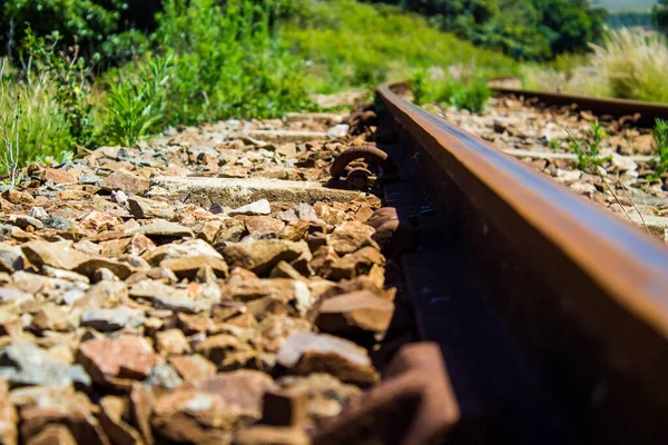 close up of rail track and stones