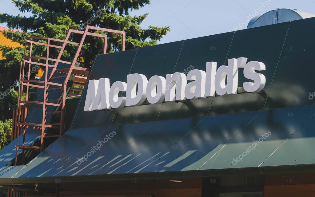 POLTAVA, UKRAINE - JUNE 4, 2022: Inscription McDonald's on the house