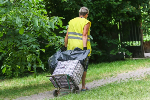 Street cleaner moves down the street