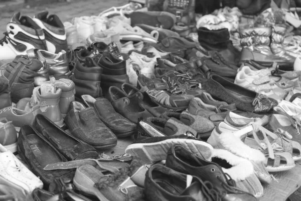Worn-out shoes on the market for the underprivileged