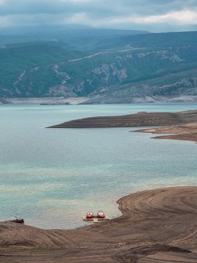 The Chirkeyskoye reservoir is the largest artificial reservoir in the Caucasus. It is located on the Sulak River. Dagestan. Russia. Beautiful vertical view.