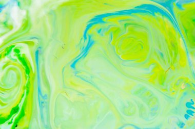 Yeşil akışkan sanat geçmişi. UFO yeşili sıvı soyut desen. Sıvı yüzeyin mermer dokusu. Akışkan sanat