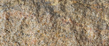 Granit desenli. Doğal kaya dokusu. Soyut taş arka plan. Dünya renkleri