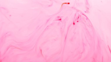 Açık pembe akışkan sanat arka planı. Sıvı bir yüzeyde bulanık pembe şekiller. Yumuşak pembe tonlardan oluşan soyut duvar kağıdı