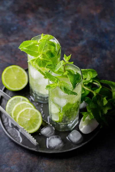 Two Glasses Mojito Cocktail Lime Slices Mint Ice Dark Background — Stockfoto