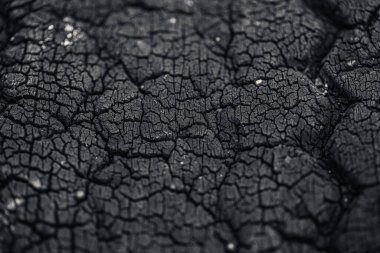 kömür siyah karbon grunge çatlak. yanmış ahşap ve eski lastik kauçuk madde desen