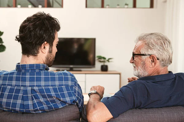 Elderly Father Son Man Talking Discuss Understanding Together Home Sofa — Foto de Stock