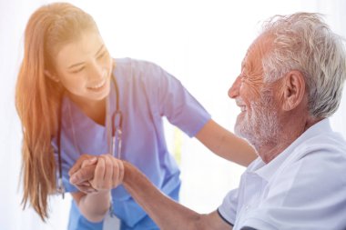 Nurse Medical Staff Worker Support Service Healthcare Senior Elder Man in Home Care happy smile looking together.