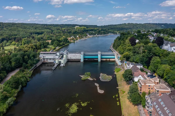 The Baldeney hydropower plant and dam is a run-of-river power plant in the city of Essen, Germany. The hydroelectric plant has a capacity of 9 Megawatts and is located on the Essen-Baldeney lake. It is operated by RWE Innogy.