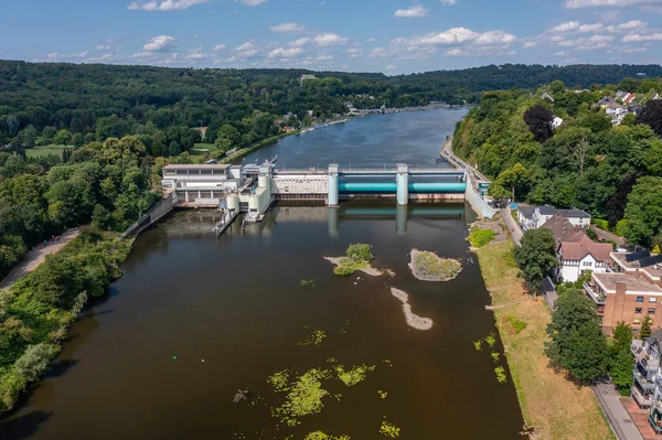 The Baldeney hydropower plant and dam is a run-of-river power plant in the city of Essen, Germany. The hydroelectric plant has a capacity of 9 Megawatts and is located on the Essen-Baldeney lake. It is operated by RWE Innogy.