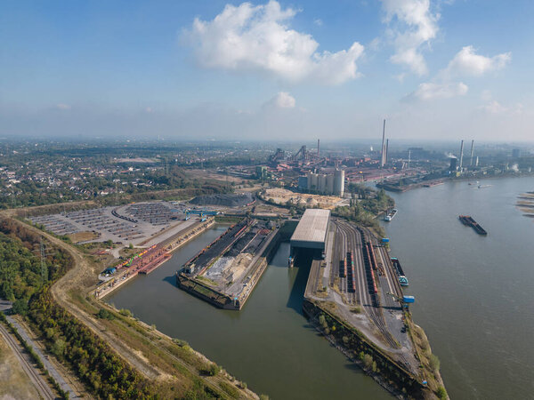 The Sdhafen Walsum, along with the Nordhafen Walsum and the Werkshafen Schwelgern, is one of the three large privately owned coal ports north of the Ruhr. It is one of the northernmost ports in the city of Duisburg and belongs to ThyssenKrupp.