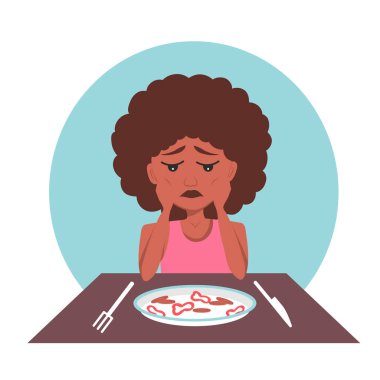 Akli dengesi bozuk çok zayıf Afro-Amerikan siyahi kadın bir tabak diyet yemeğine bakar ve yemekten korkar, kilosundan memnun olmaz, daha fazla kilo vermek ister..