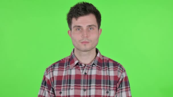 Portrait of Young Man Smiling at Camera, Green Chroma Screen — 비디오