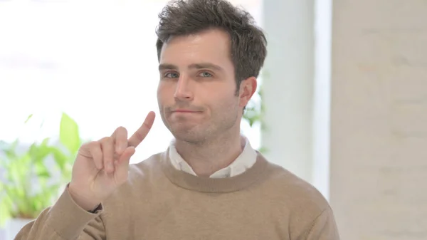 Portrait of Man Showing No Sign by Finger, Denial — Stock Photo, Image