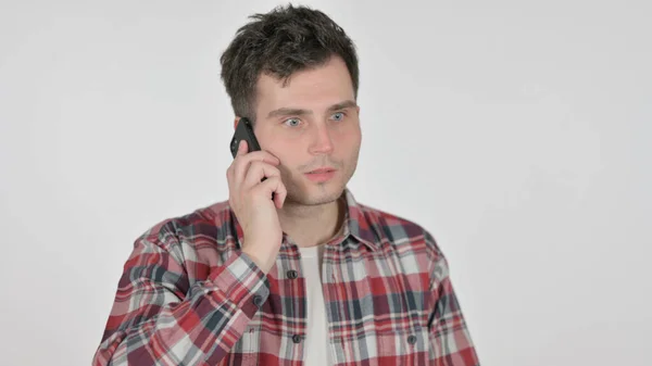 A fiatalember arcképe Telefonon beszél. — Stock Fotó
