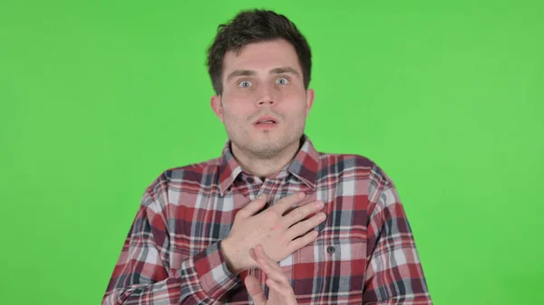 Portrait of Young Man Feeling Scared, Frightened, Green Chroma Screen — Stok Foto