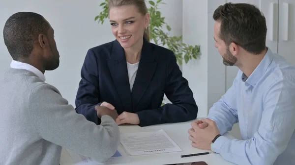 Mixed Race Business People Shaking Hands in Office — Stock Photo, Image