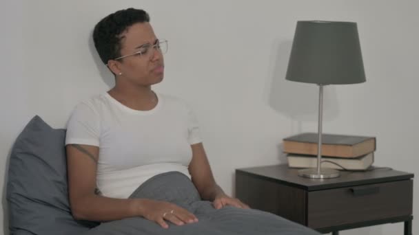 Upset African Woman Feeling Worried While Sitting in Bed — Stock Video