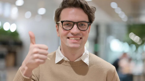 Portrait of Handsome Young Man showing Thumbs Up Sign — Stok Foto