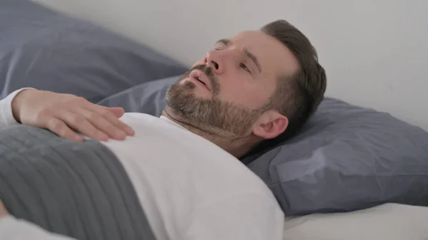 Man Waking up from Nightmare in Bed — Stock Photo, Image