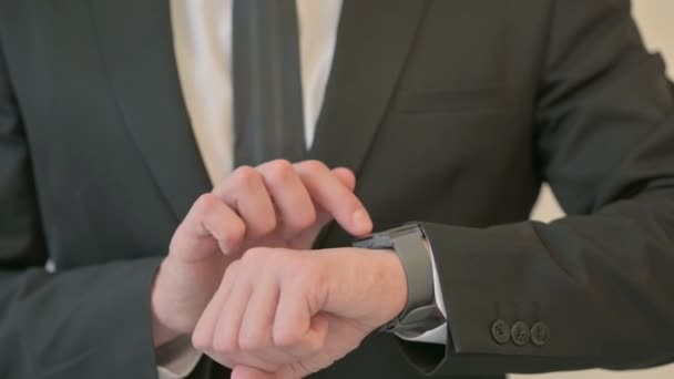 Close up of Middle Aged Businessman using Smart Watch — Stock video