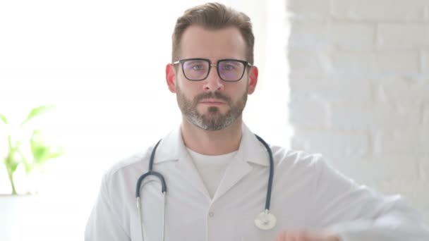Portrait of Doctor showing Thumbs Down Gesture — Video Stock