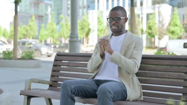 Tense African American Man Feeling Frustrated While Sitting Outdoor Bench — Stok Video