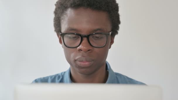 Close African Man Smiling Camera While Using Laptop Office — Video