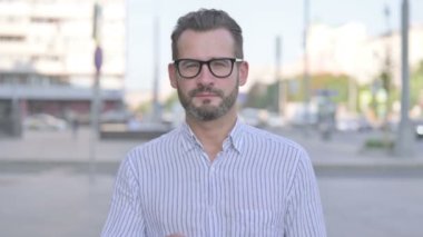 Adult Man Pointing at the Camera and Inviting Outdoor