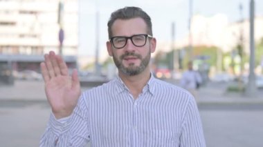 Online Video Chat by Talking Adult Man Outdoor