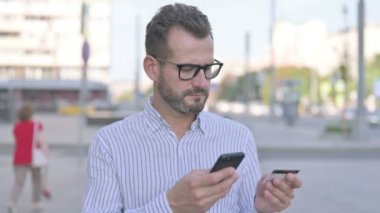 Outdoor Adult Man Feeling Upset of Fail Online Shopping