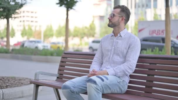 Adult Man Standing Leaving Sitting Bench Outdoor — Stockvideo