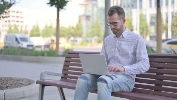 Adult Man Laptop Showing Thumbs Sign While Sitting Outdoor Bench — Stock Video