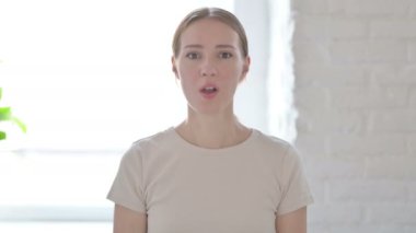 Shocked Young Woman Wondering in Awe, Astonished