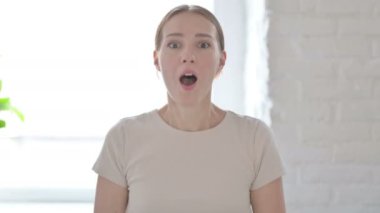 Excited Young Woman Celebrating Success, Feeling Happy