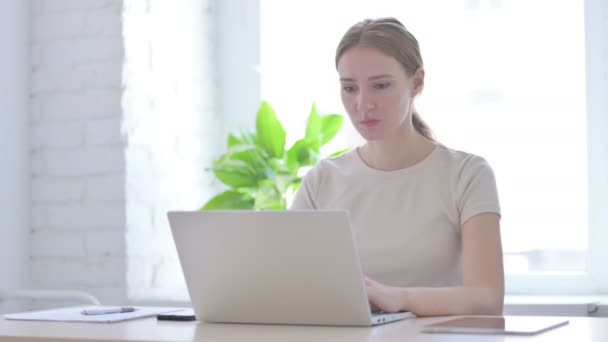 Young Woman Reacting Financial Loss While Using Laptop — Stockvideo