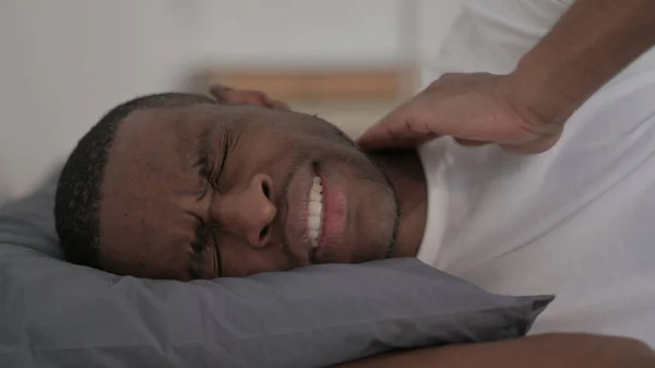 Close African Man Having Neck Pain While Sleeping Bed — Stok fotoğraf