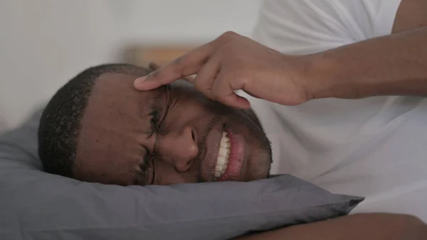 Close African Man Having Headache While Sleeping Bed — Stock fotografie