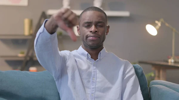 Portrait African Man Showing Thumbs While Sitting Sofa — Stockfoto