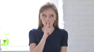 Man Putting Fingers on Lips, Silence Please