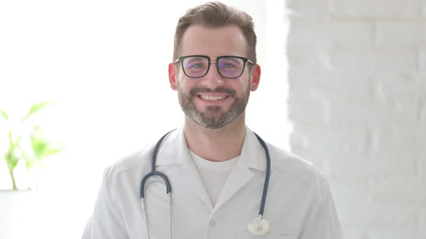 Attractive Middle Aged Doctor Smiling Camera — Stockfoto