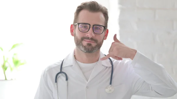 Middle Aged Doctor Showing Call Sign — Stock Photo, Image