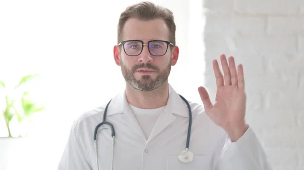 Middle Aged Doctor Talking Online Video Call — Stockfoto