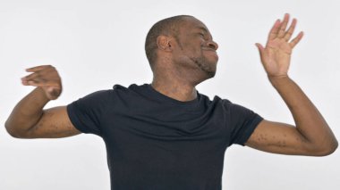 African Man Dancing in Joy on White Background